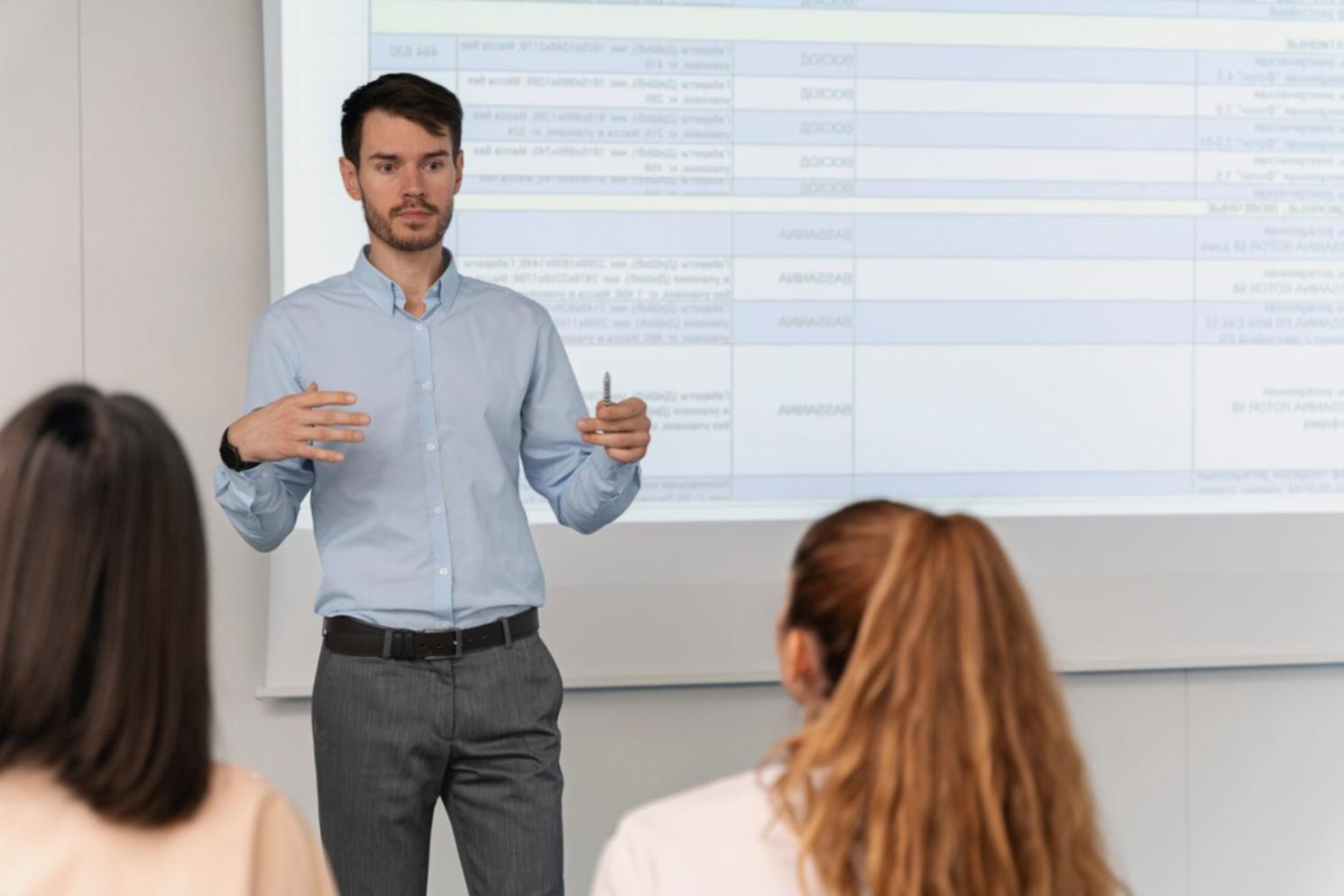 Business owner reviewing financial documents and charts during strategy session
