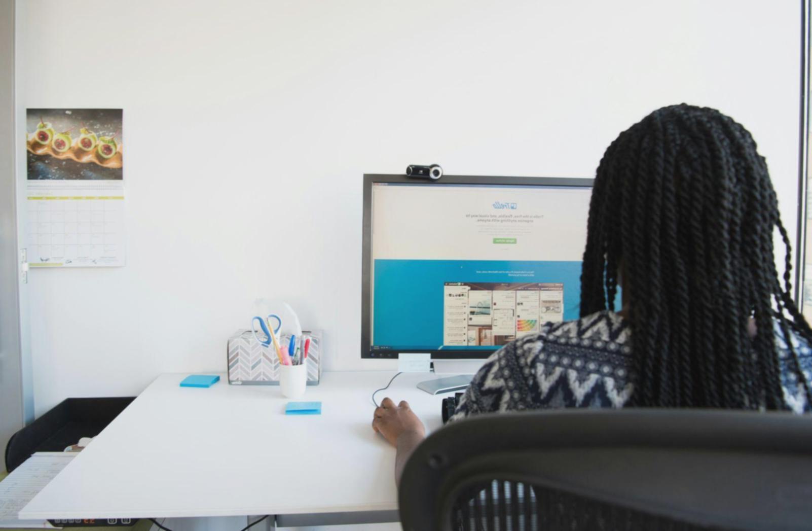 Organized workspace showing financial planning materials and laptop with data analysis